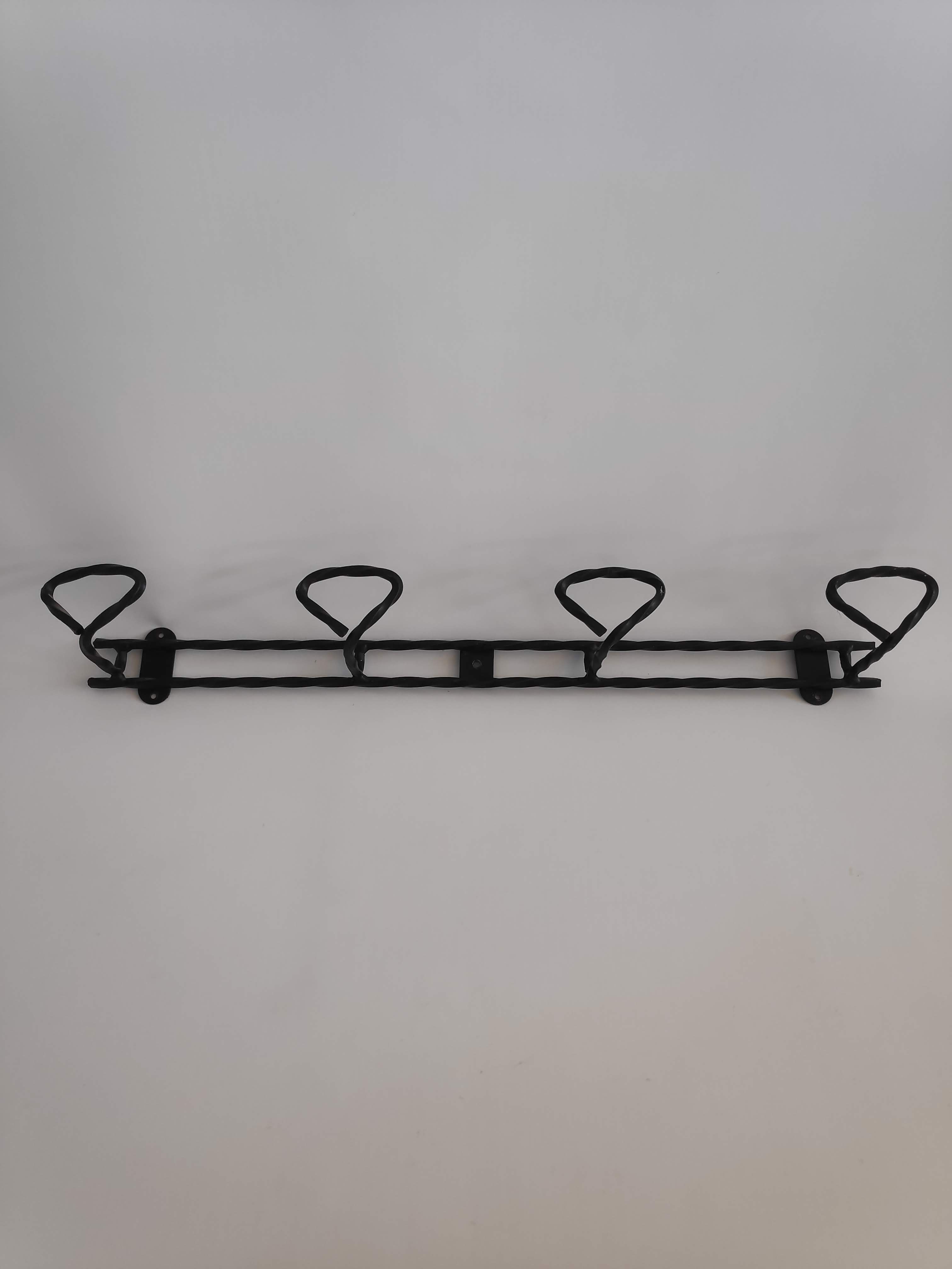 Wall door with 4 twisted metal pads from the 1950s