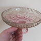 Small pink tinted molded crystal display cup