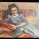 HSP portrait of a young woman seated, signed Lilly Véréa 20th century.