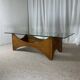 Sculptural coffee table in mahogany and glass – Europe, 1970s
