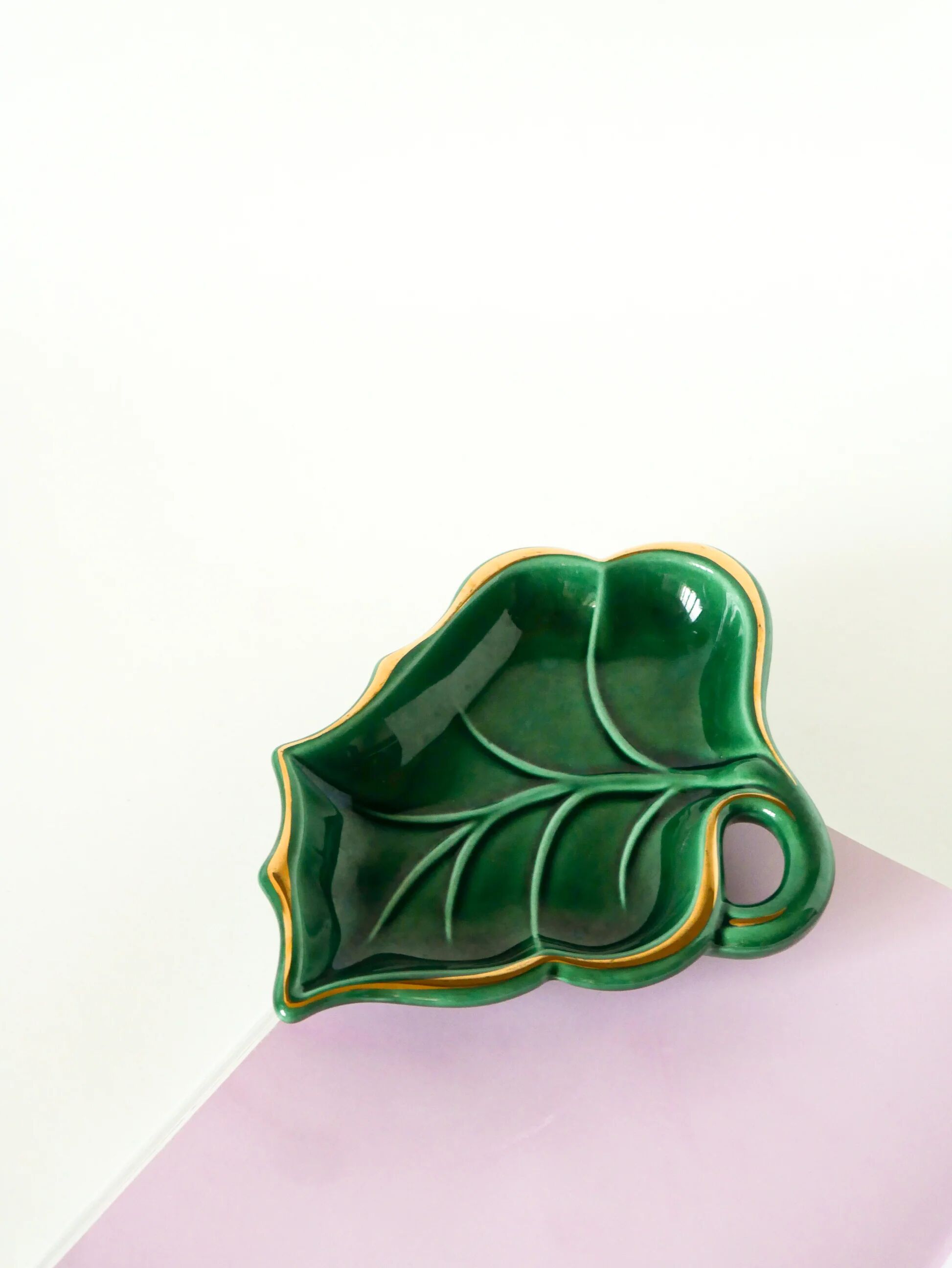 Leaf-shaped earthenware catchall, green and gold, 1970.
