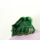Leaf-shaped earthenware catchall, green and gold, 1970.