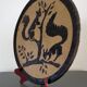 Dauphinois plate in glazed terracotta from the 1950s by Claude Faure, featuring squirrels.