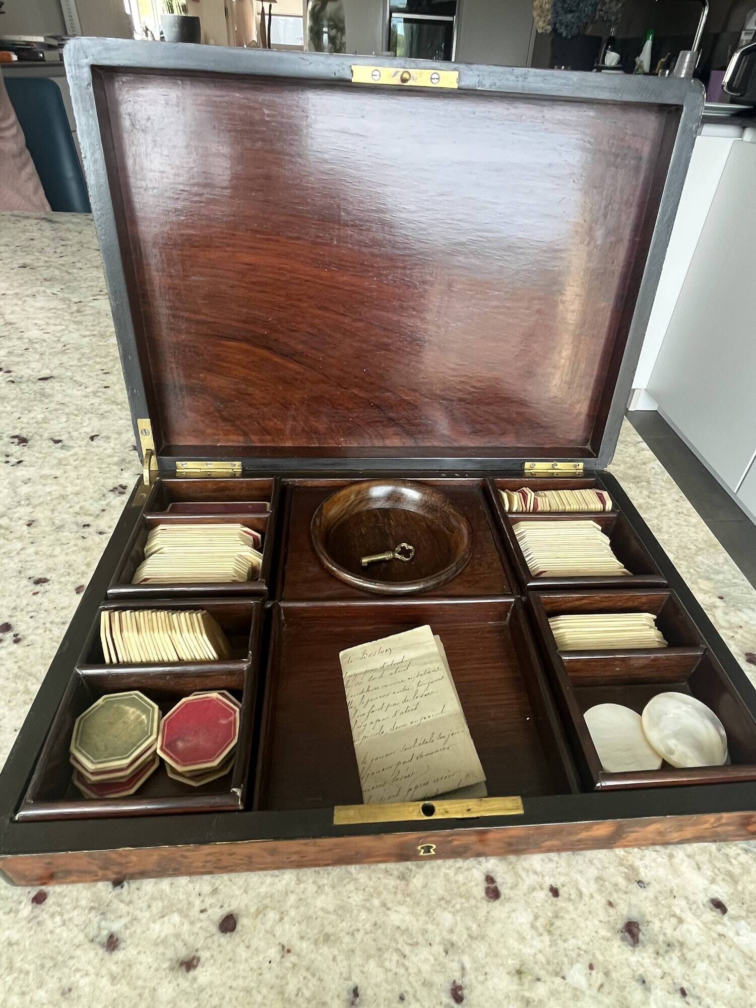 Antique Boston game box from the 19th century - marquetry, tokens, and handwritten rules.