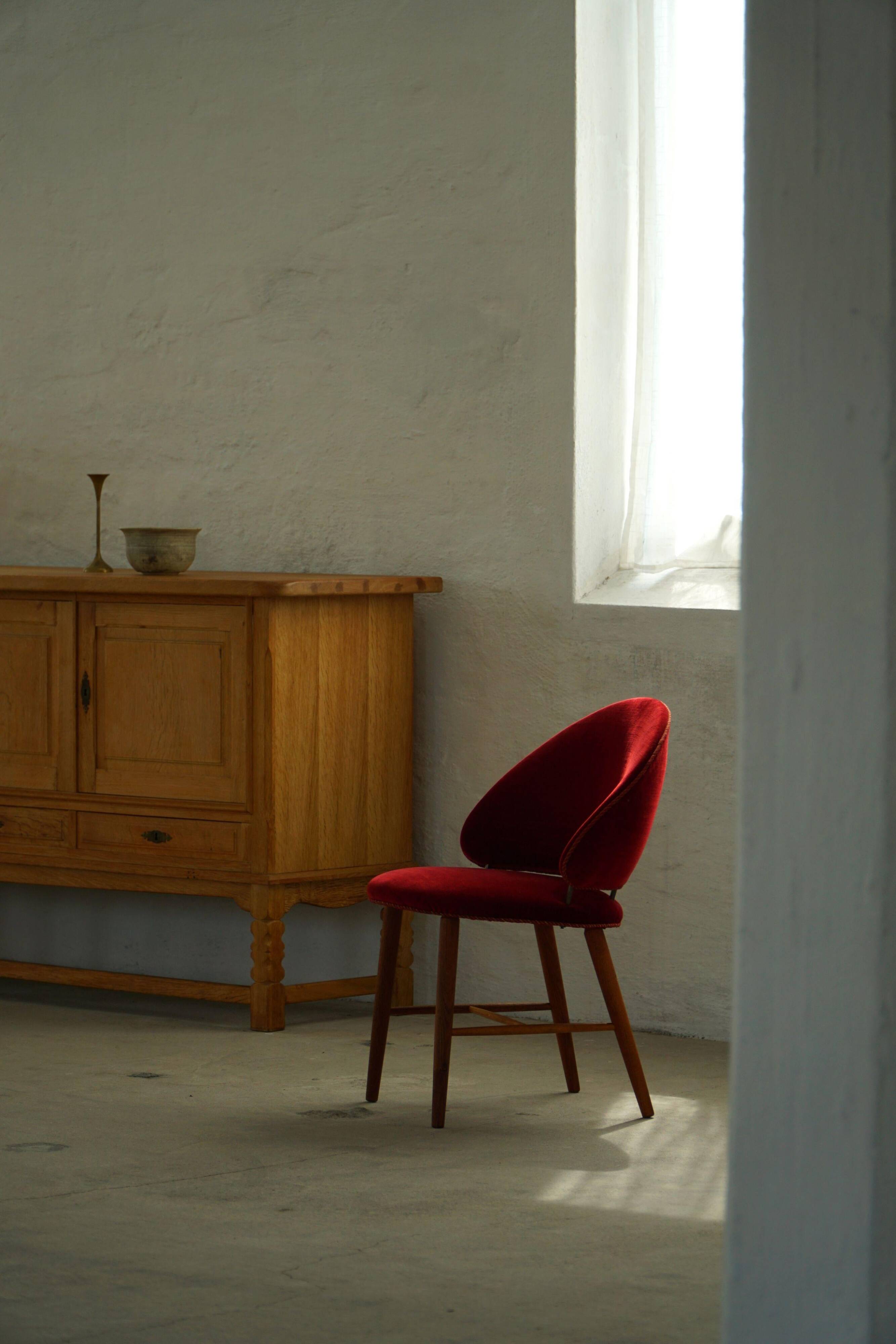 Mid-century toilet chair in oak and red velvet, by a Danish cabinetmaker, 1950s.