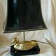 Lamp with brass duck on lacquered wood base