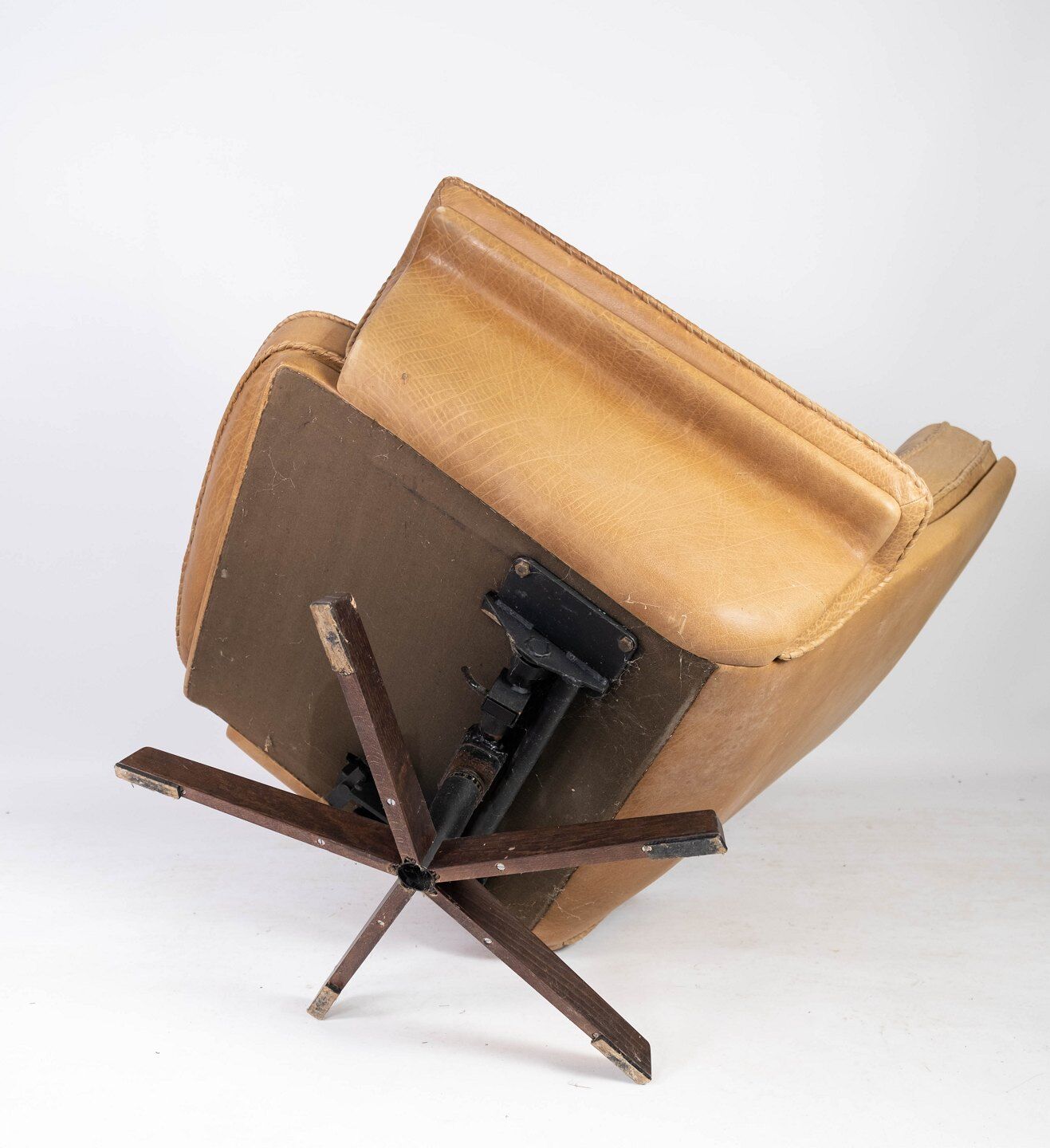 Armchair and stool in 1960s Danish leather and rosewood