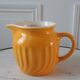 Yellow ceramic pitcher 70s