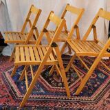 Set of 4 folding chairs in varnished wood