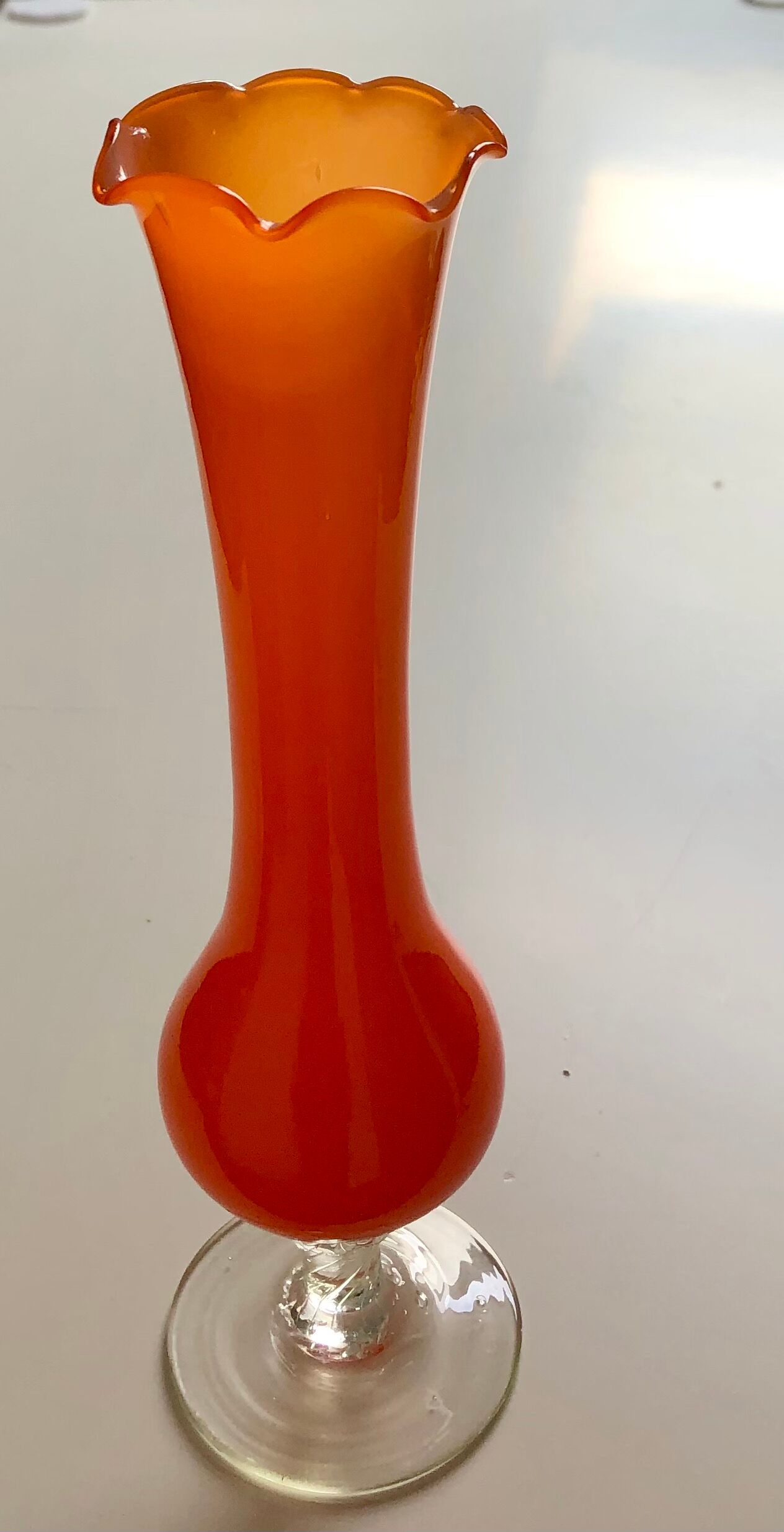 Soliflore in orange glass