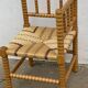 Art Deco turned wood straw corner armchair