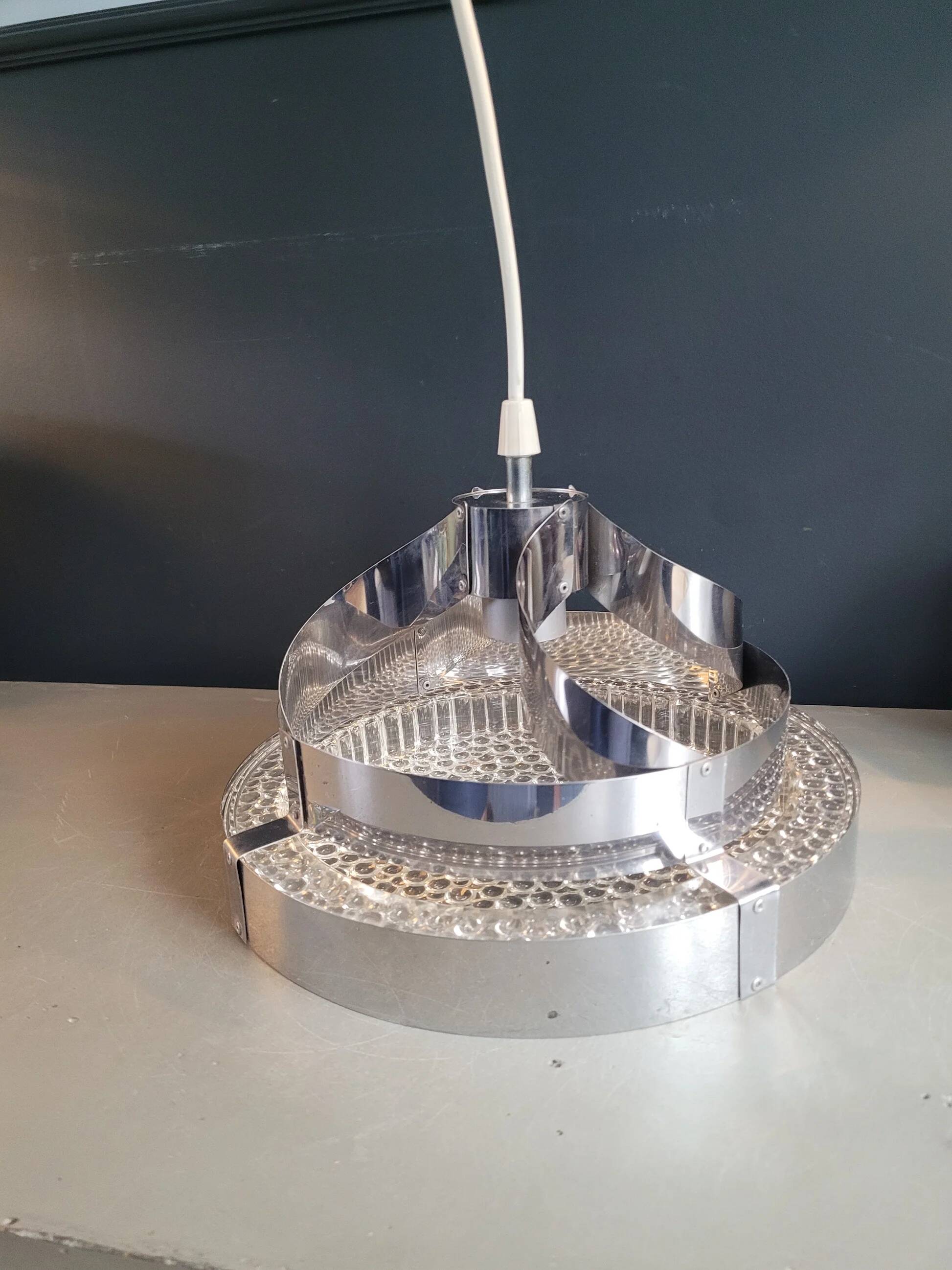 Suspension space-age in plastic bubble and aluminium