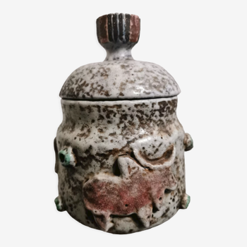 Ceramic pot decorated with bulls in relief