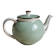 Antique Villeroy and Boch ceramic teapot in gold and celadon green.