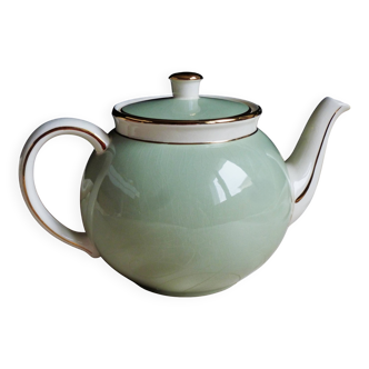 Antique Villeroy and Boch ceramic teapot in gold and celadon green.