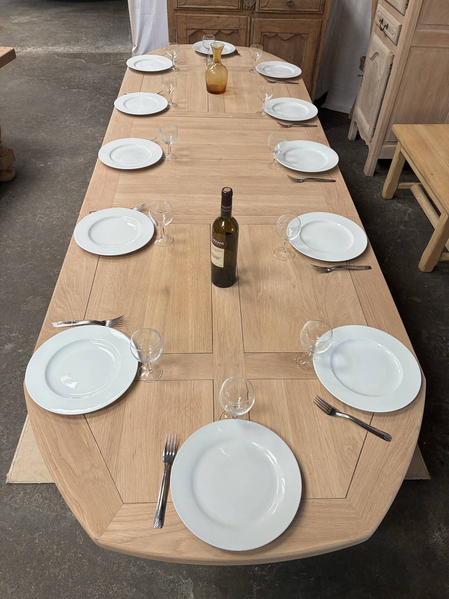 Solid oak farmhouse table with extensions.