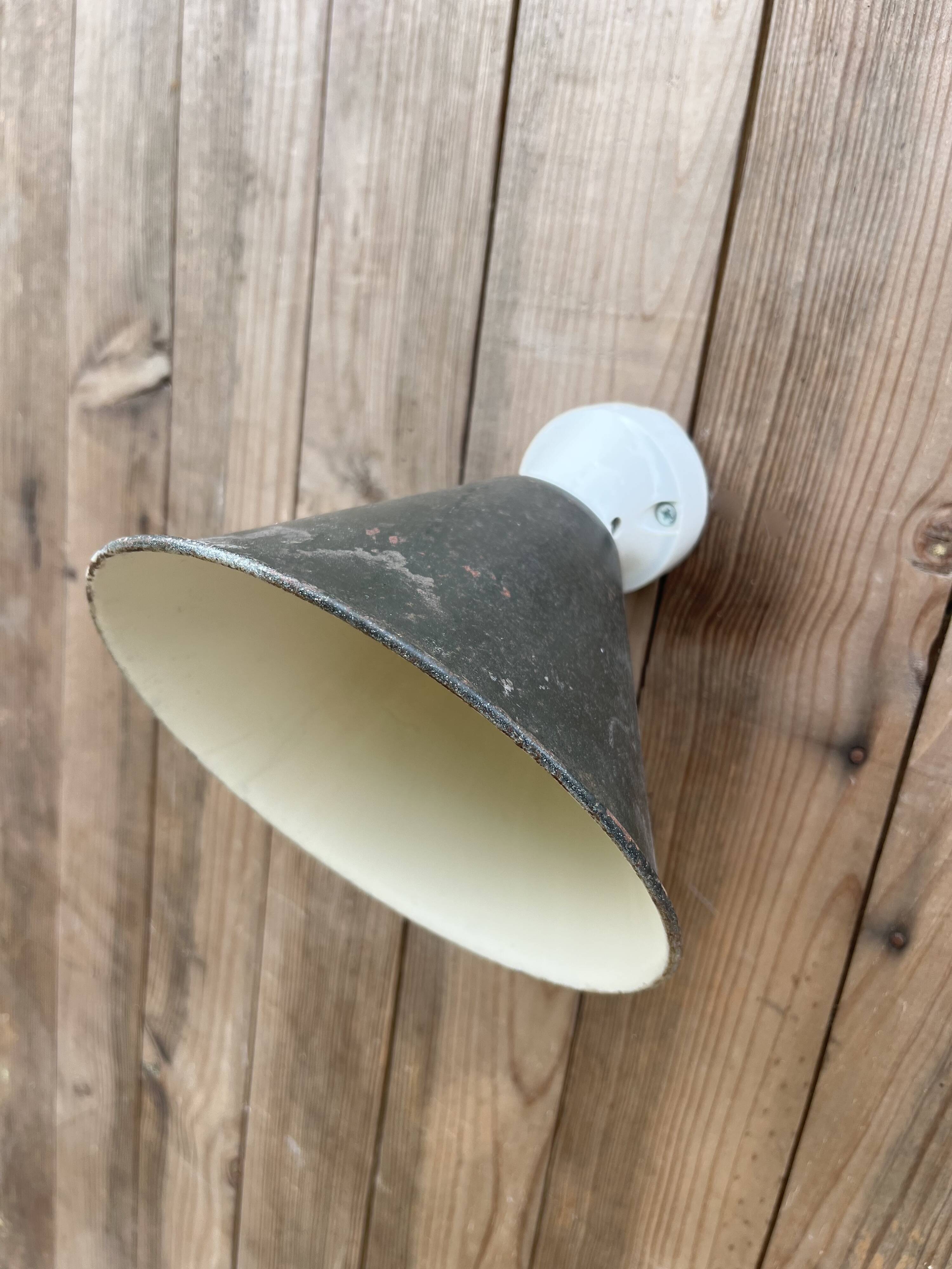 Conical wall light on porcelain base