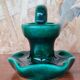 Green earthenware candle holder