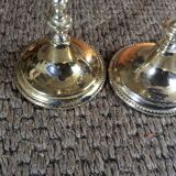 Pair of gold metal candle holders