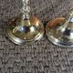 Pair of gold metal candle holders