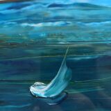 Peinture marine petit format signée en bas à droite. Encadrée, sous verre