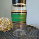 Large bottle former pharmacy early nineteenth century double green label