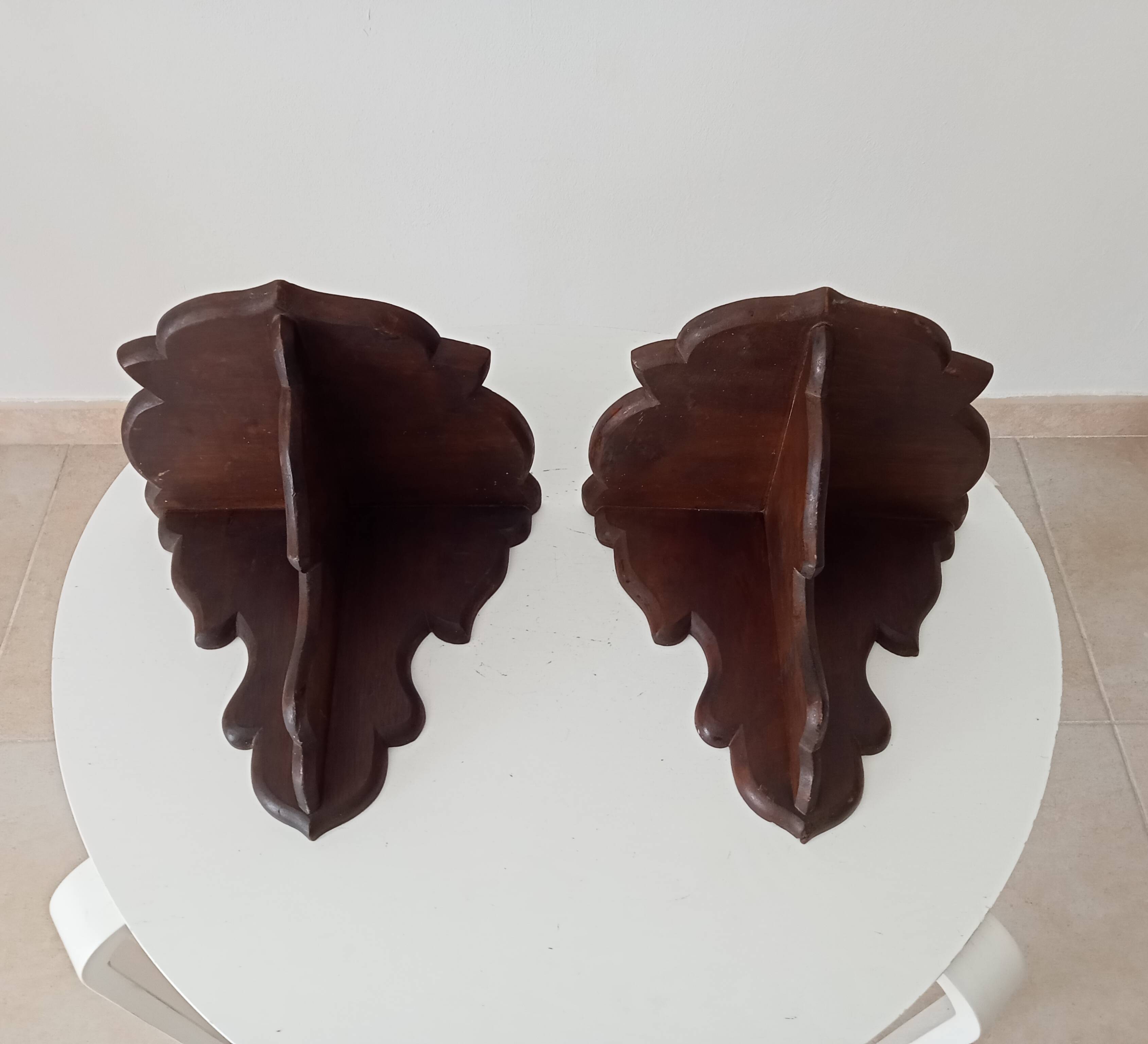 Pair of antique carved wooden shelves