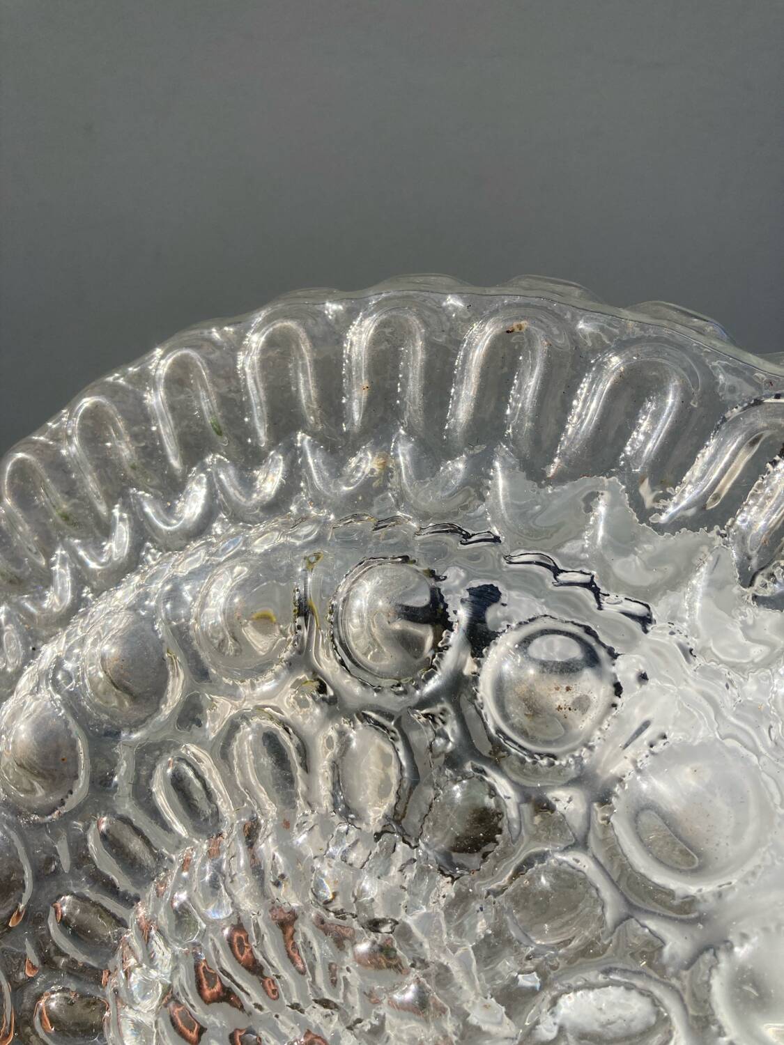 Pair of transparent round glass wall lights