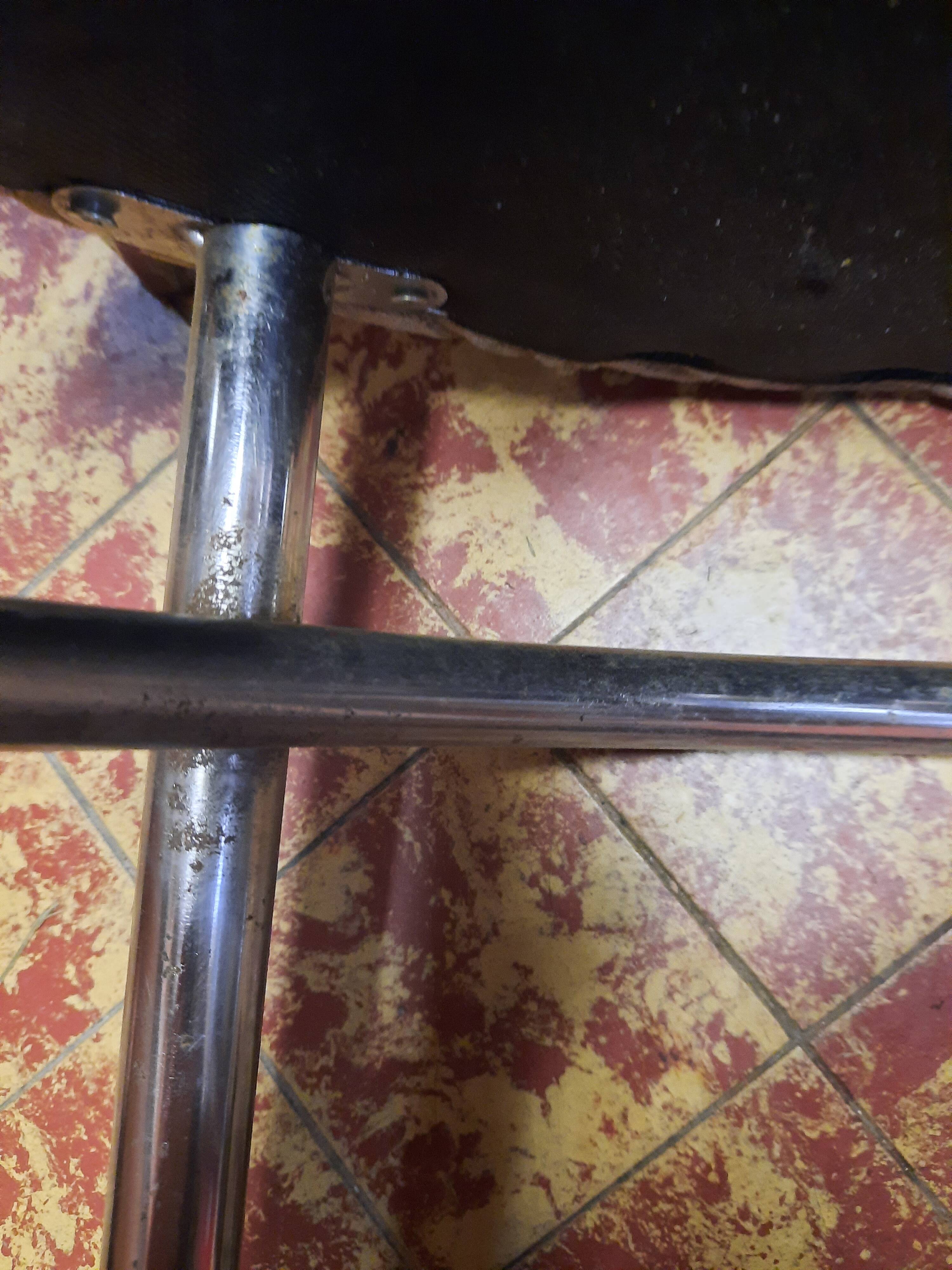 Pair of tubular metal bistro chairs