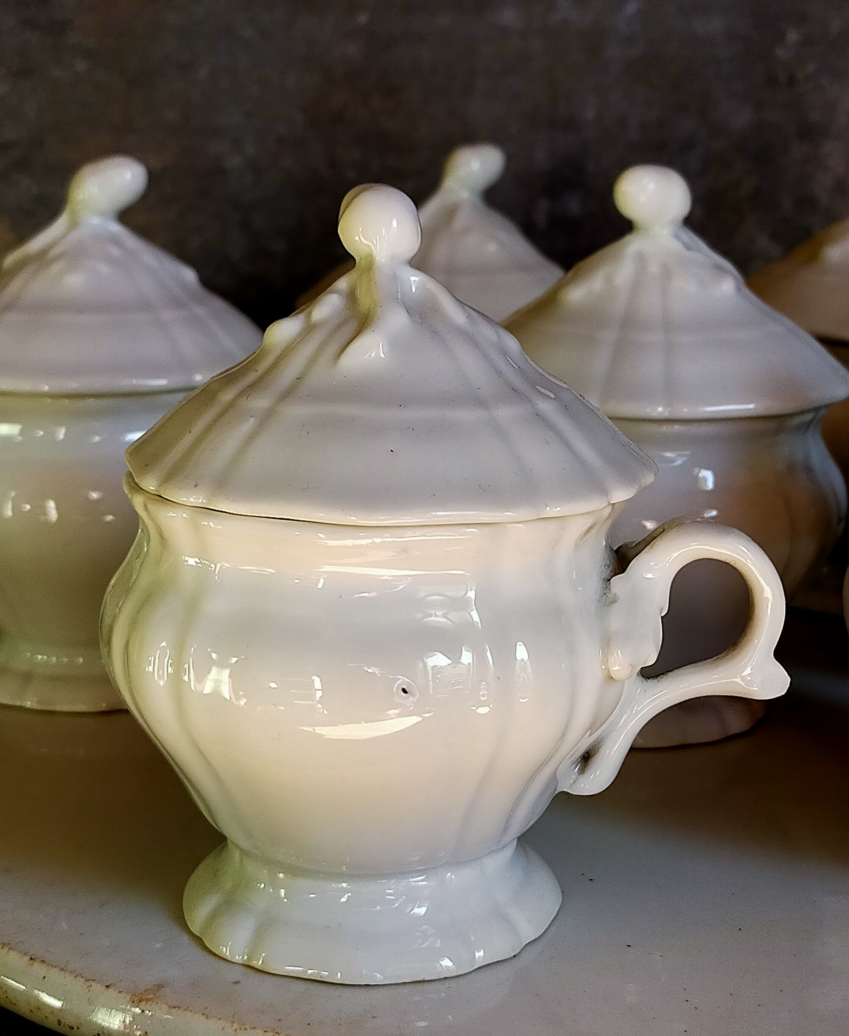 Set of seven covered pots and tray old white slurry nineteenth