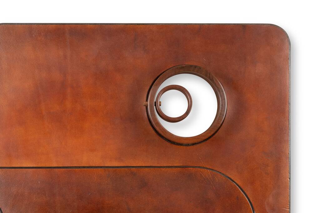 Stools and wall lights in cherry wood and leather. 1970s.
