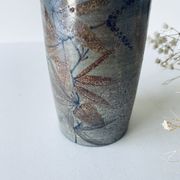 Vase tubulaire en céramique signé