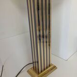 Pair of black and gold art deco style lamps