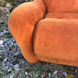 Orange velvet armchair