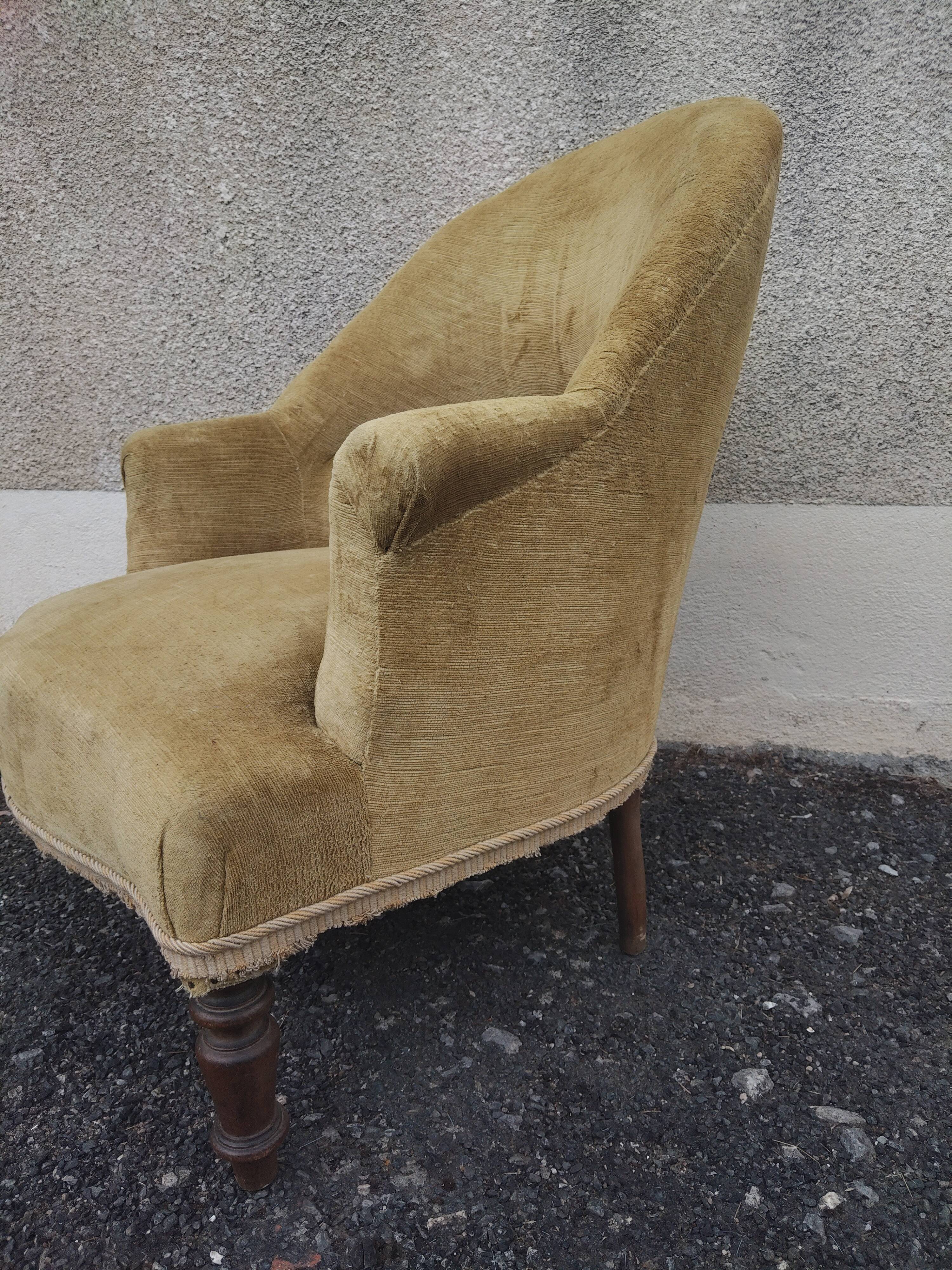Antique Napoleon III crab chair in patinated mustard velvet.
