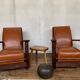PAIR OF BRUTALIST ARMCHAIRS IN TEAK AND VINTAGE COGNAC LEATHER FROM THE 1950S