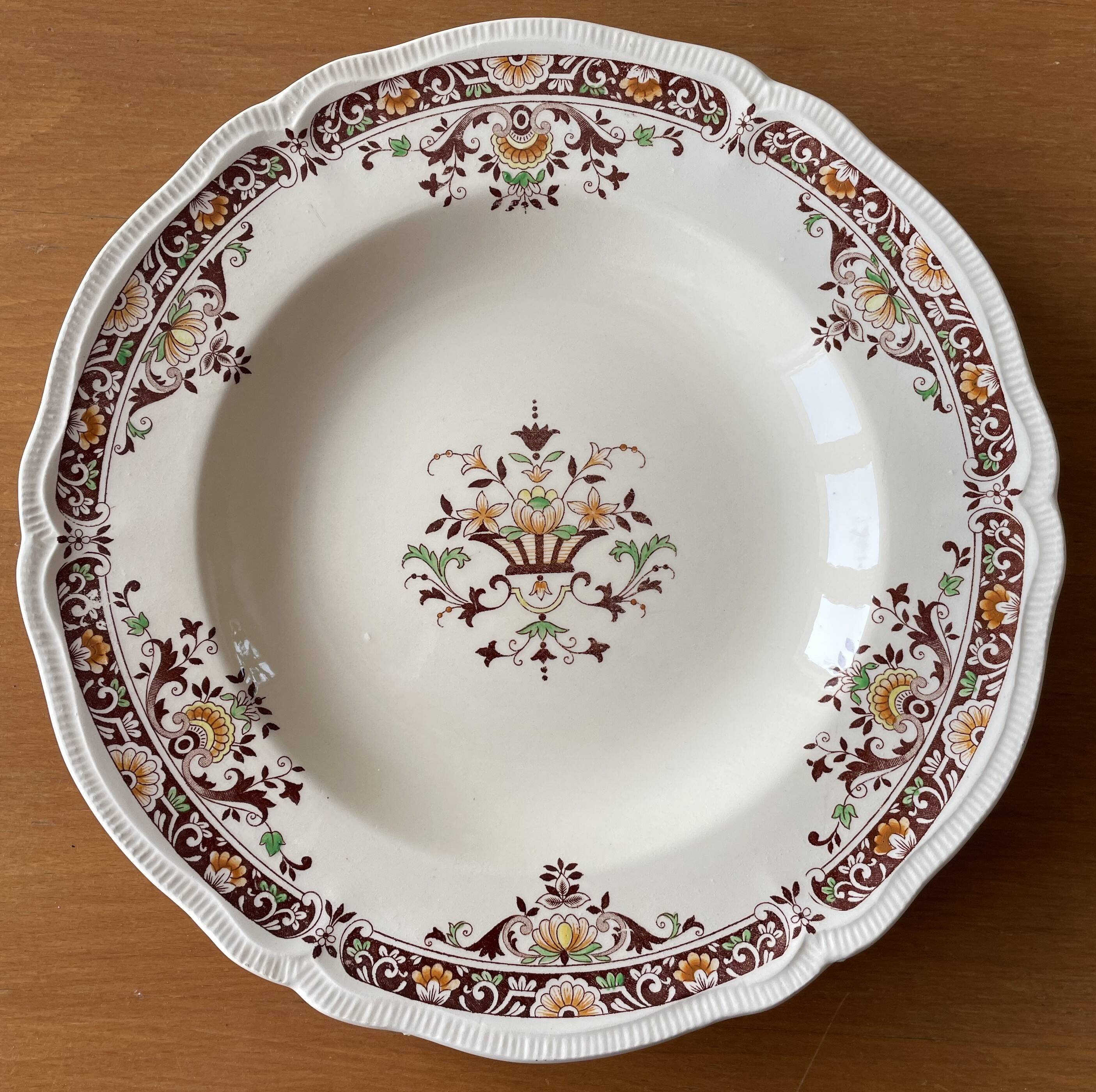 6 antique semi-deep plates in Longchamp earthenware.