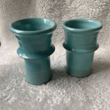 Two lovely turquoise ceramic mug vases.