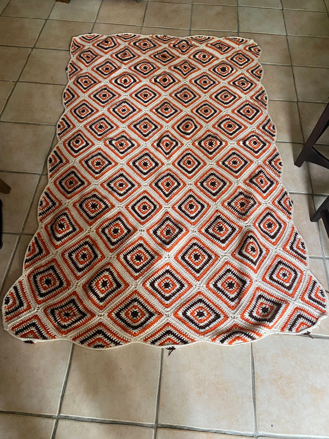 Orange and brown crochet throw