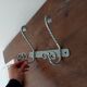Vintage wrought iron wall coat rack