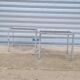 Pair of side tables in chrome metal and glass