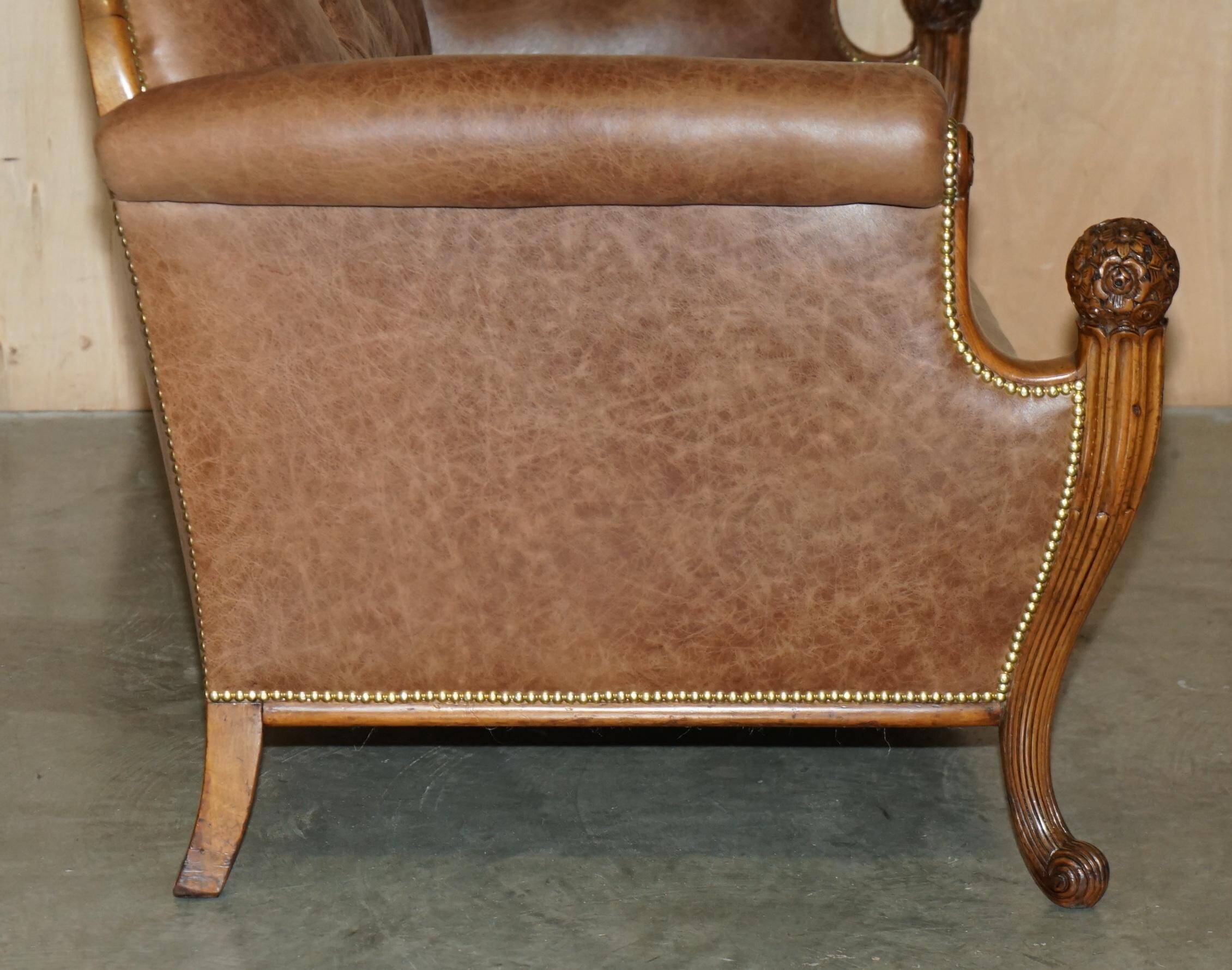 Chesterfield Regency 1810 antique canapé restored in leather with a carved frame.