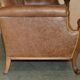 Chesterfield Regency 1810 antique canapé restored in leather with a carved frame.