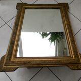 Mirror with gilded wood and stucco frame, early 20th century, 59x83cm
