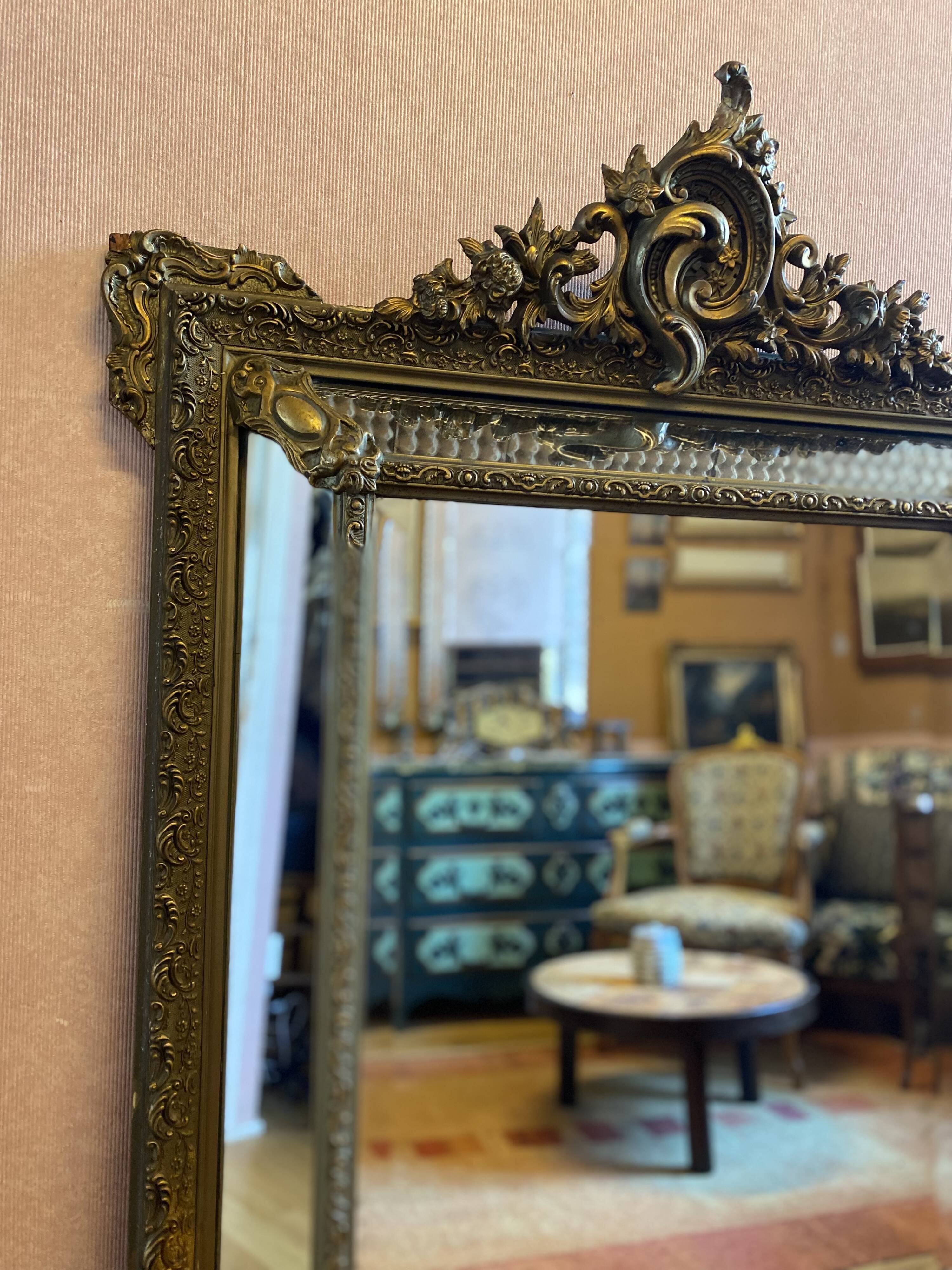 Bevelled mirror with gilded stucco parclose, from the Napoleon III period