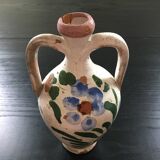 Small old amphora with floral decoration