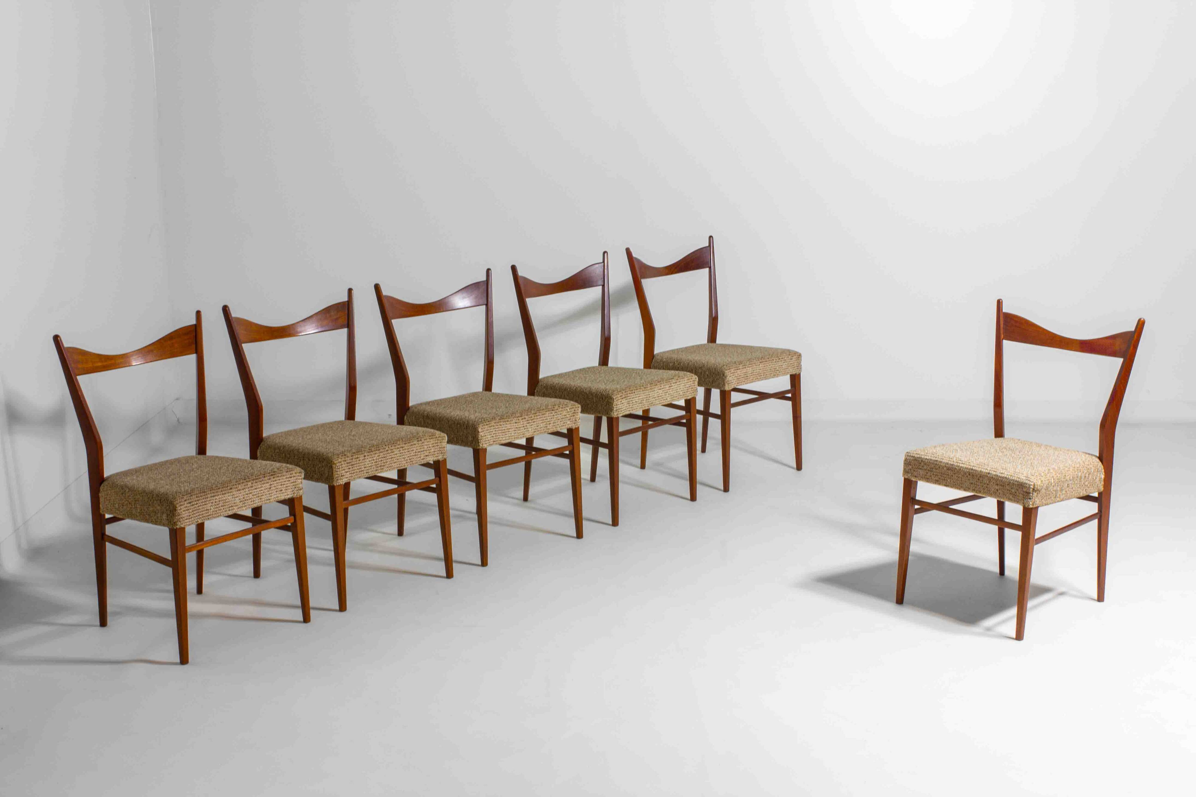 Set of slender mid-century dining chairs with finely curved backs, 1960s