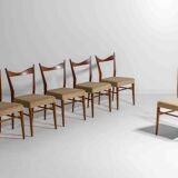 Set of slender mid-century dining chairs with finely curved backs, 1960s