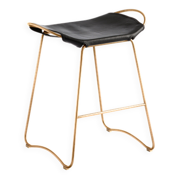 Contemporary stool, aged brass metal and black leather.