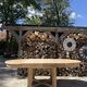 Round solid oak table with extensions, maximum 220cm.
